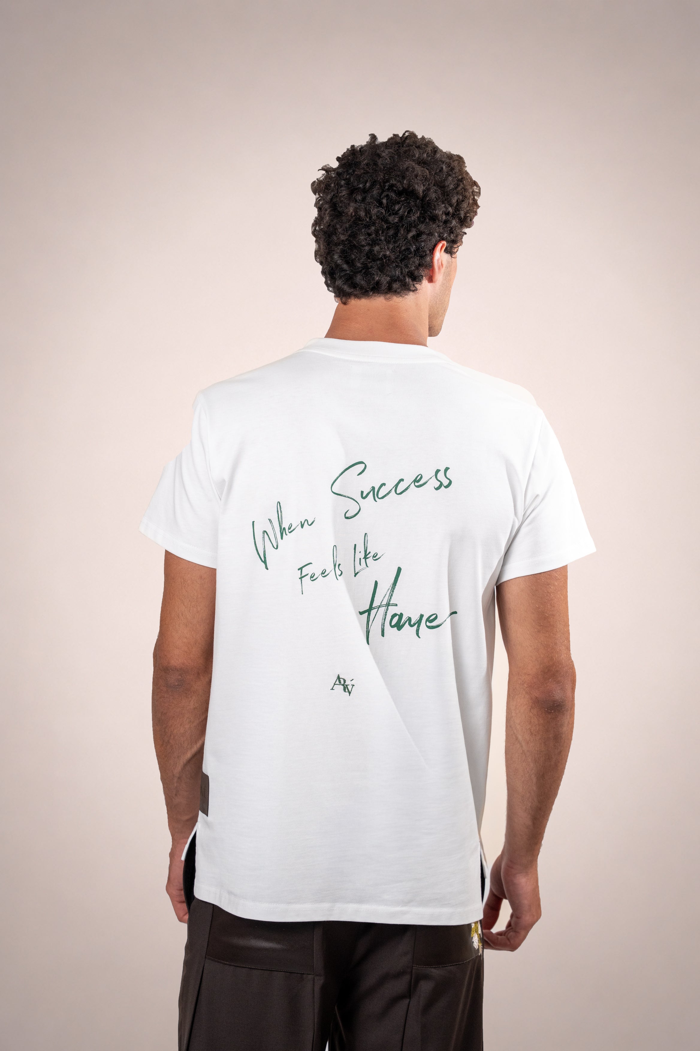 The "When Success Feels Like Home" T-shirt